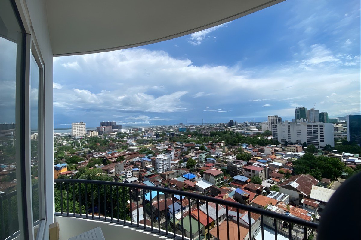 5. Large 1-Bedroom Condo with Panoramic Views Living area of the 1-bedroom apartment for sale in Cebu City