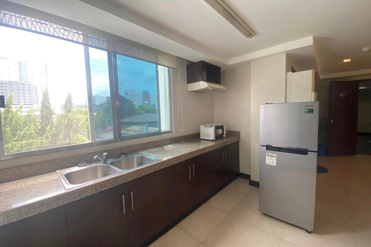 Very Spacious 2BR Condominium Unit (1) Living area of the 2-bedroom condo for rent in Cebu City